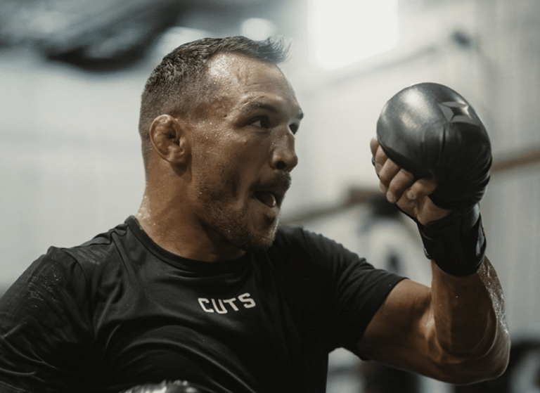 Michael Chandler taquine un combat avec le champion BMF Max Holloway
