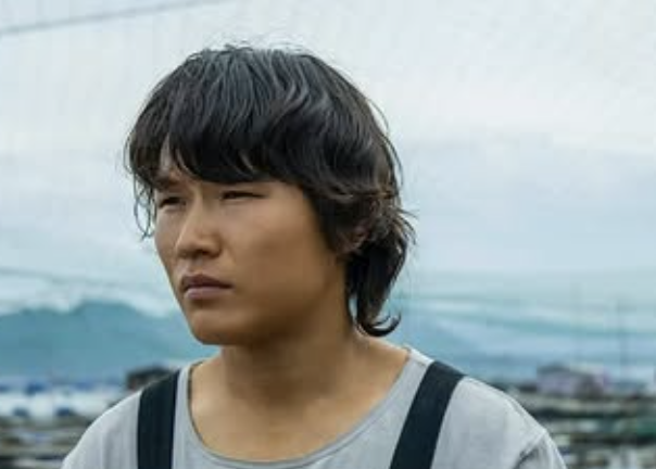 Zhang Weili traversant le grand écran