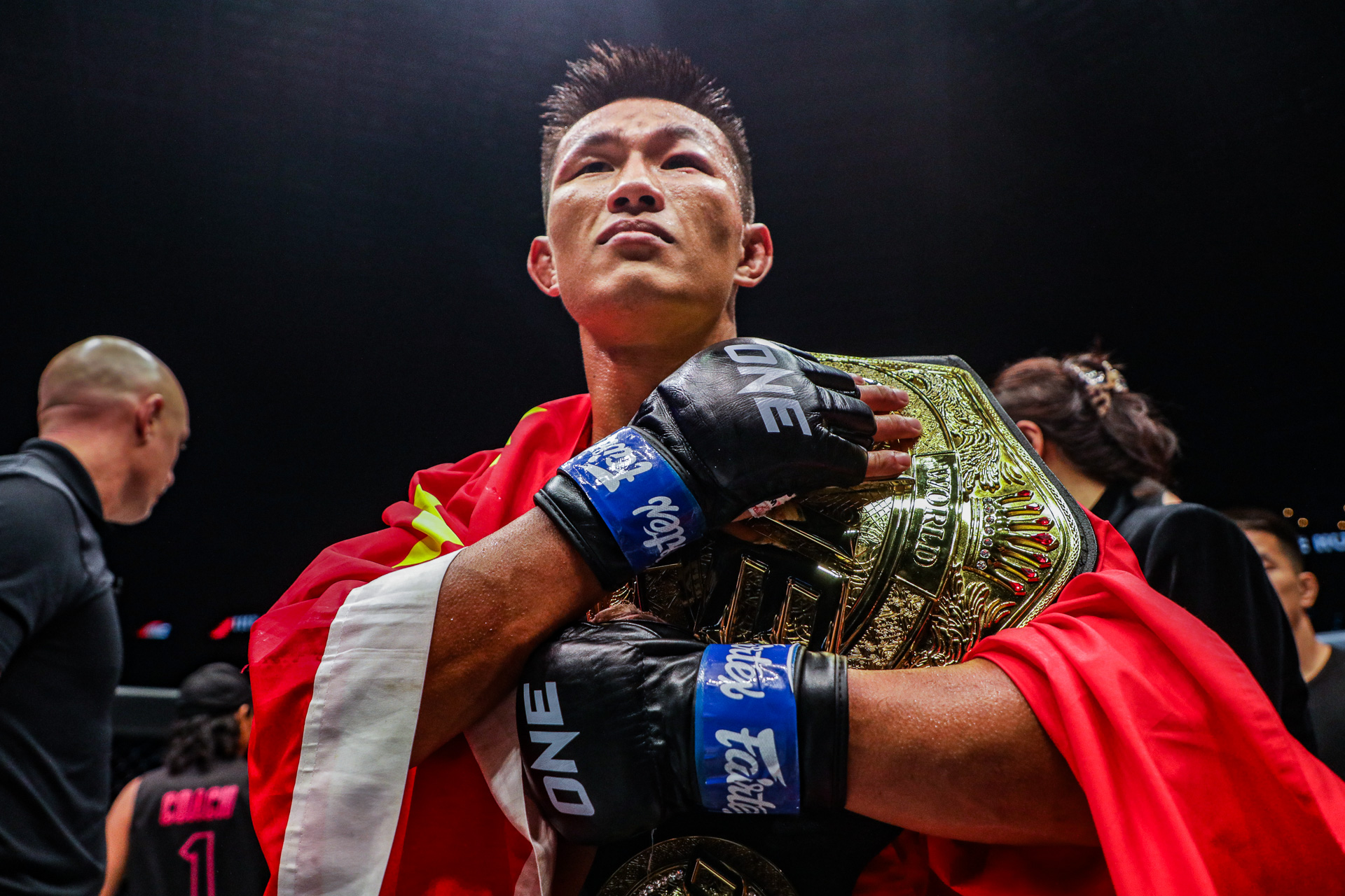 Tang Kai celebrates after winning ONE Featherweight MMA World Championship at ONE 160