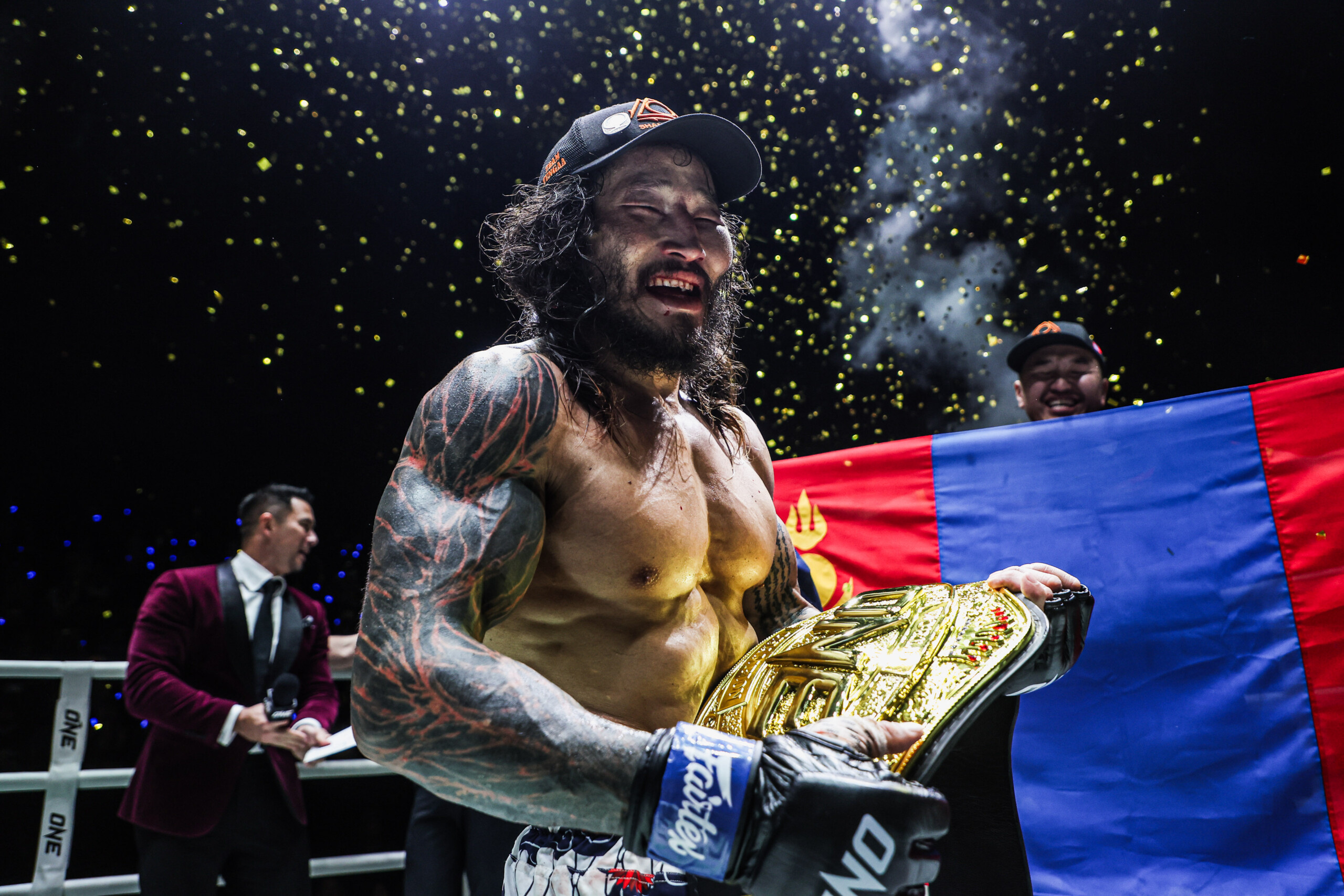 Enkh-Orgil Baatarkhuu celebrates his World Title win against Fabricio Andrade at ONE Fight Night 38.
