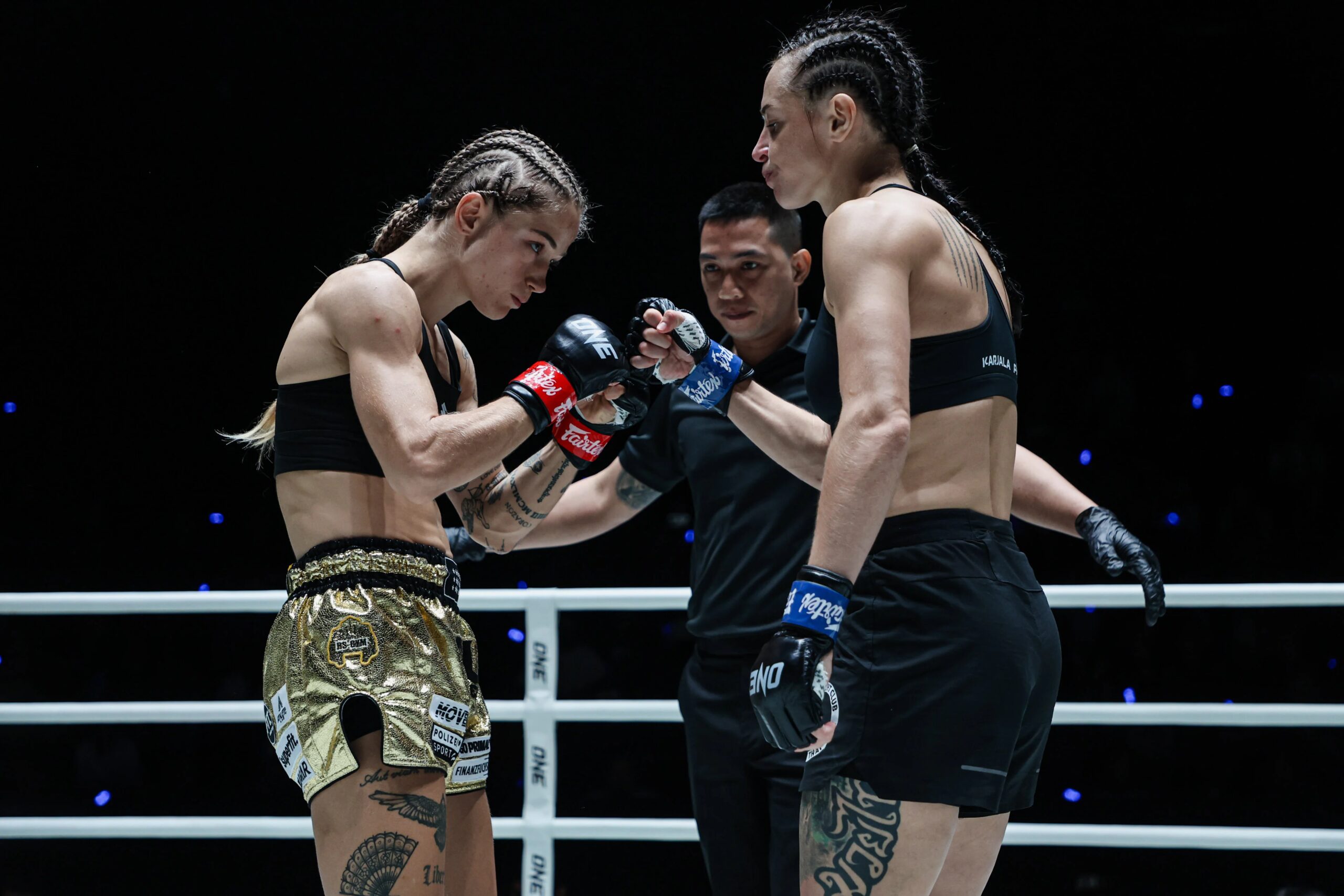 Stella Hemetsberger and Natalia Diachkova touch gloves before their Muay Thai World Title match